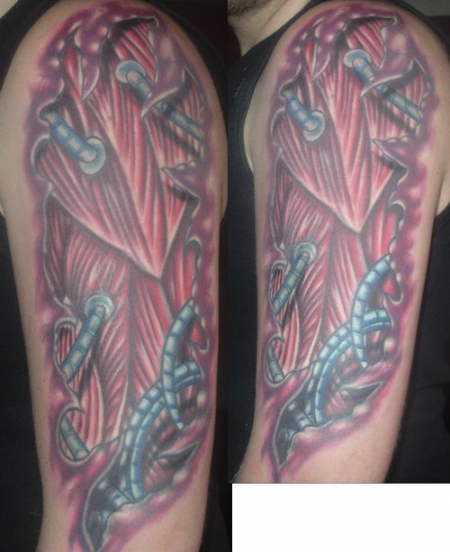 BioMechanic Oberarm Tattoo