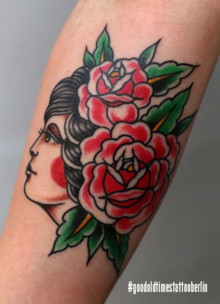 traditional flower girl tattoo